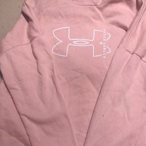 A pink under amour sweatshirt